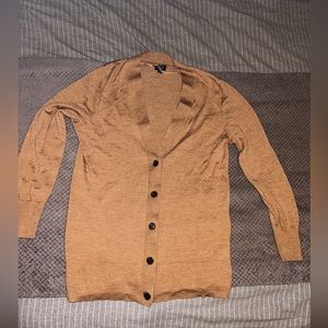 100% Merino Wool cardigan.